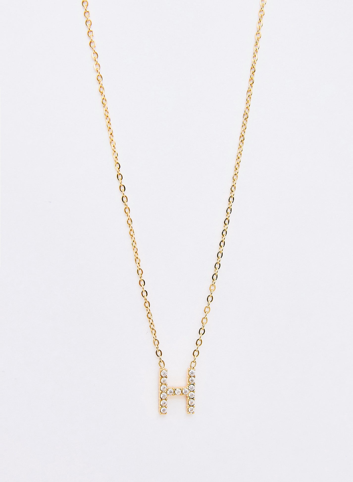 COLLAR INICIAL DORADO ABALORIOS